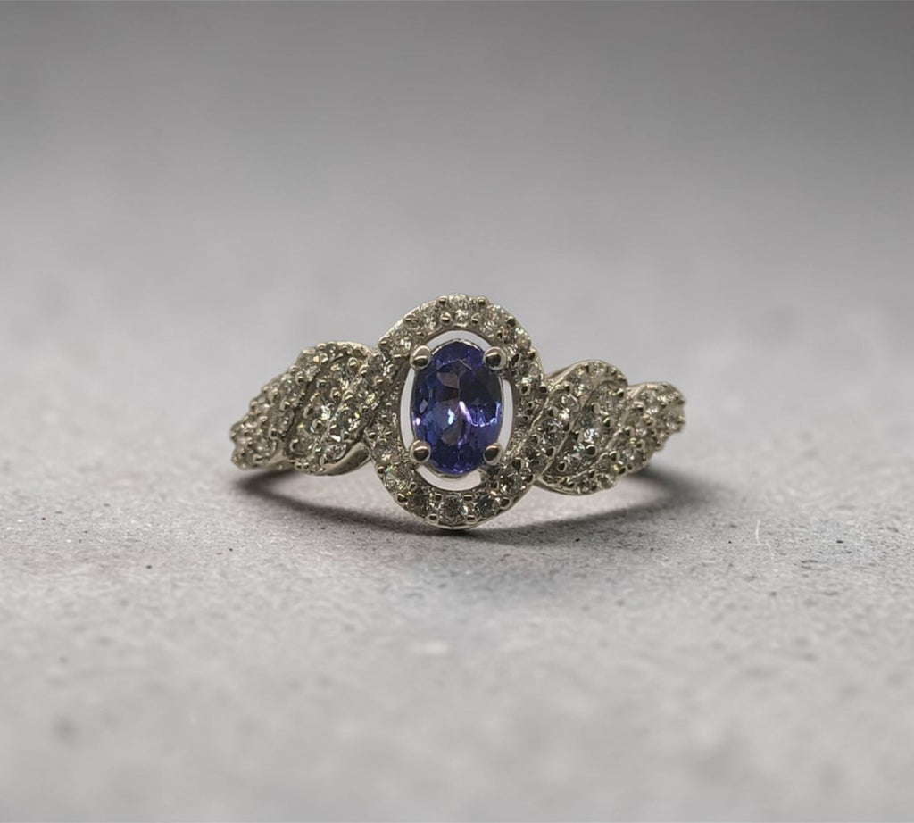5009 AAA Tanzanite and White Zircon Ring