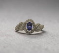 5009 AAA Tanzanite and White Zircon Ring