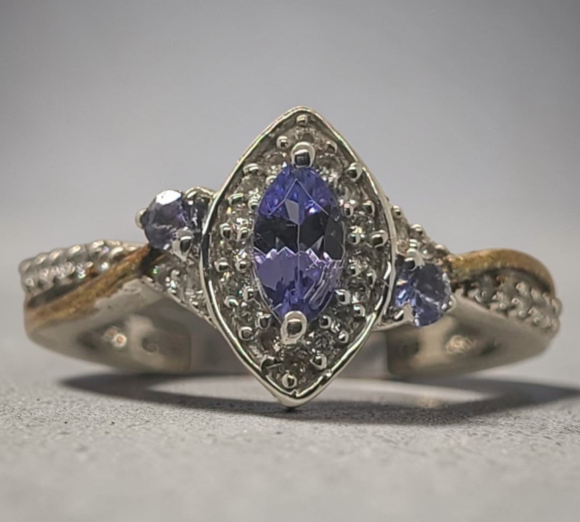 5012 AAA Tanzanite and White Zircon Ring