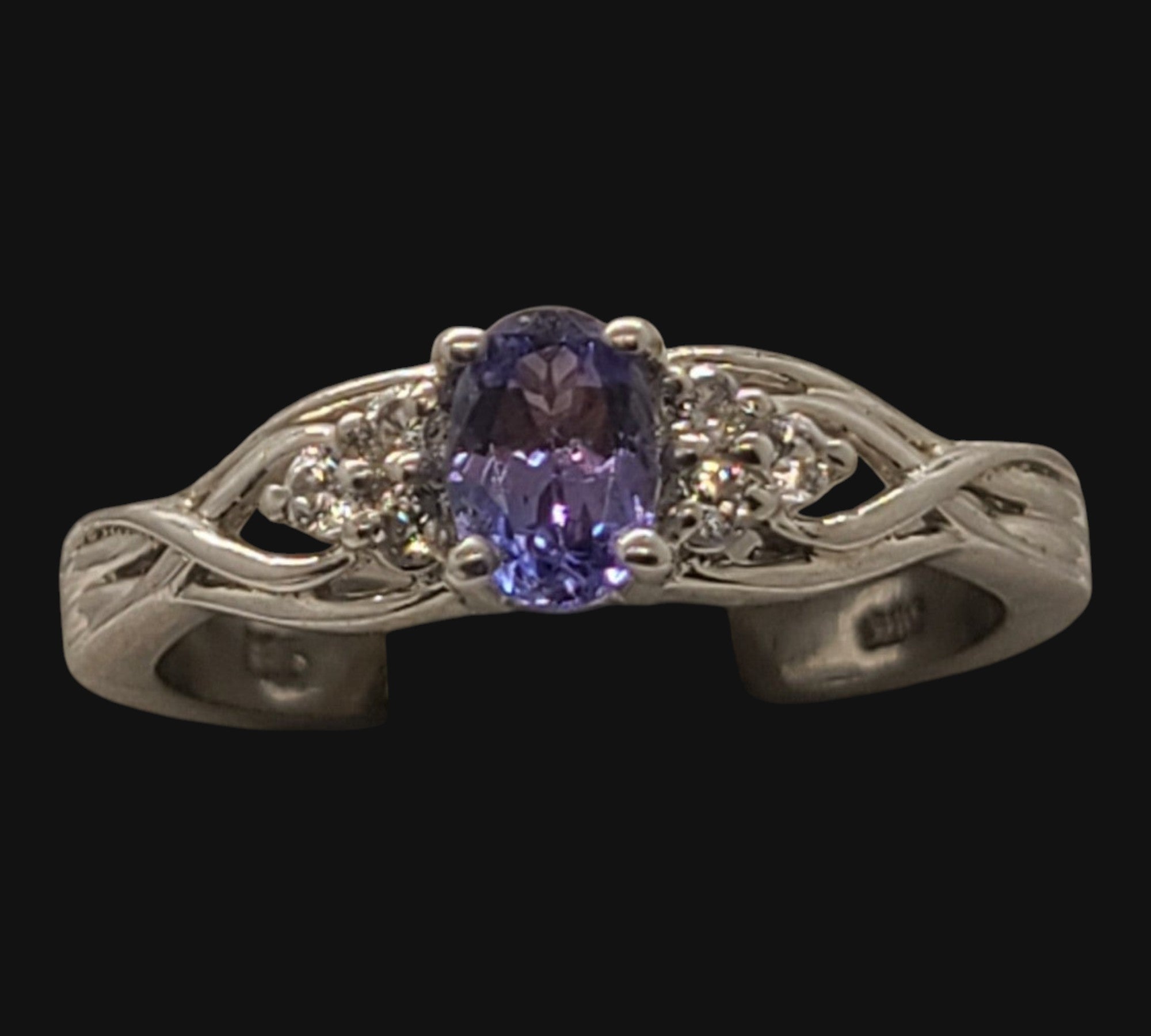 5020 Tanzanite and white Zircon ring