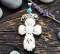 5078 Carved Bone Floral Cross Pendant